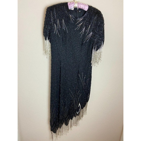 laurence kazar beaded dress SOLDLaurence dress, size petite medium Stunning 80s beaded silk mini with sequined shoulders and keyhole back This dress is in mint condition! I don't see one bead or sequin Laurence Kazar Size Vintage Laurence Kazar Beaded Jacket